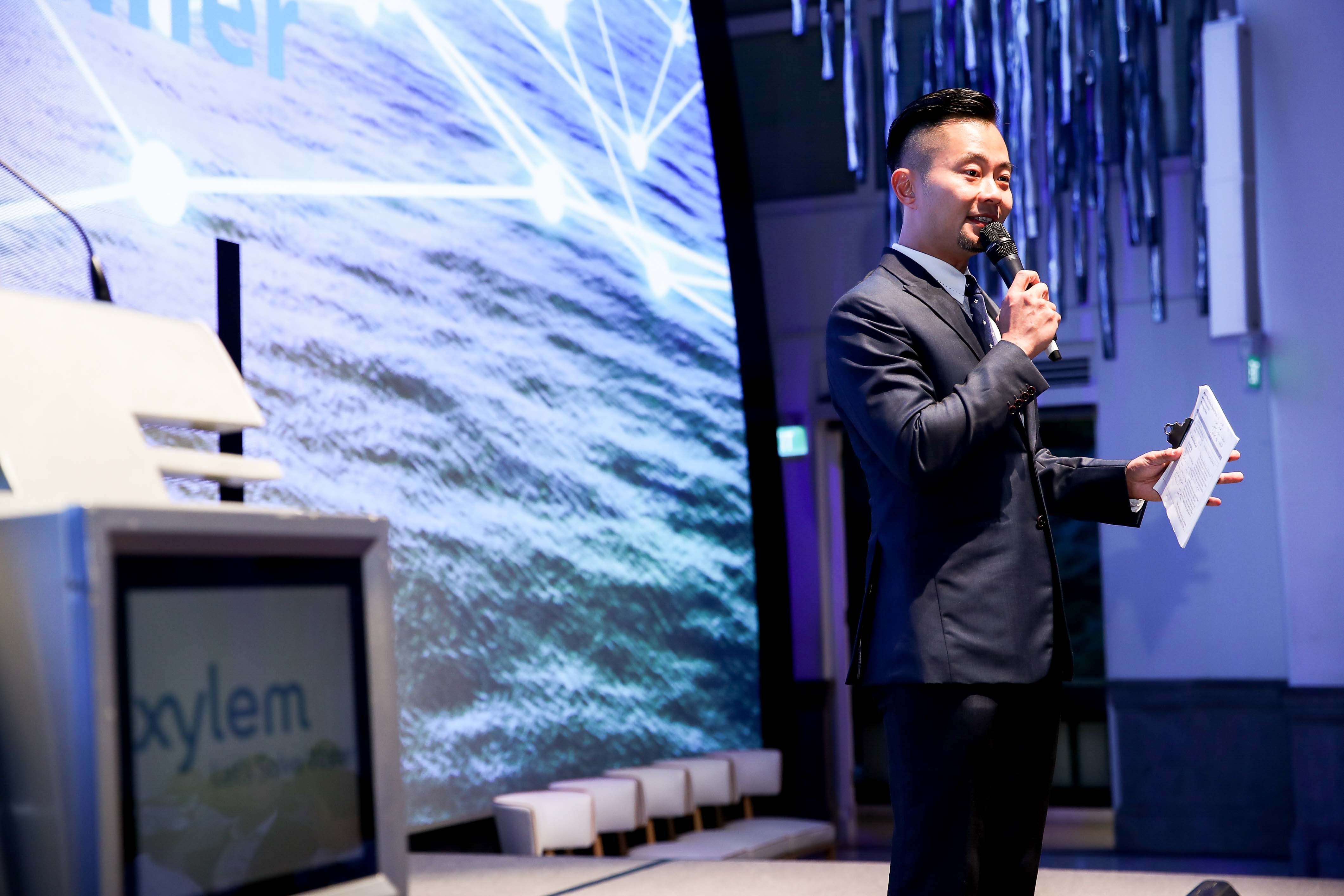 Emcee Daniel Ong with COMPASS